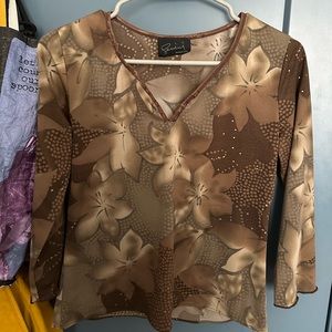 Super cute brown floral shirt. Lightly worn.